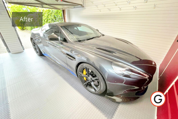 Grey Aston Martin luxury car garage design