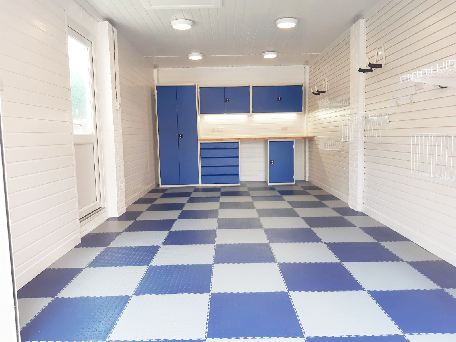 garage makeover with coloured floor tiles