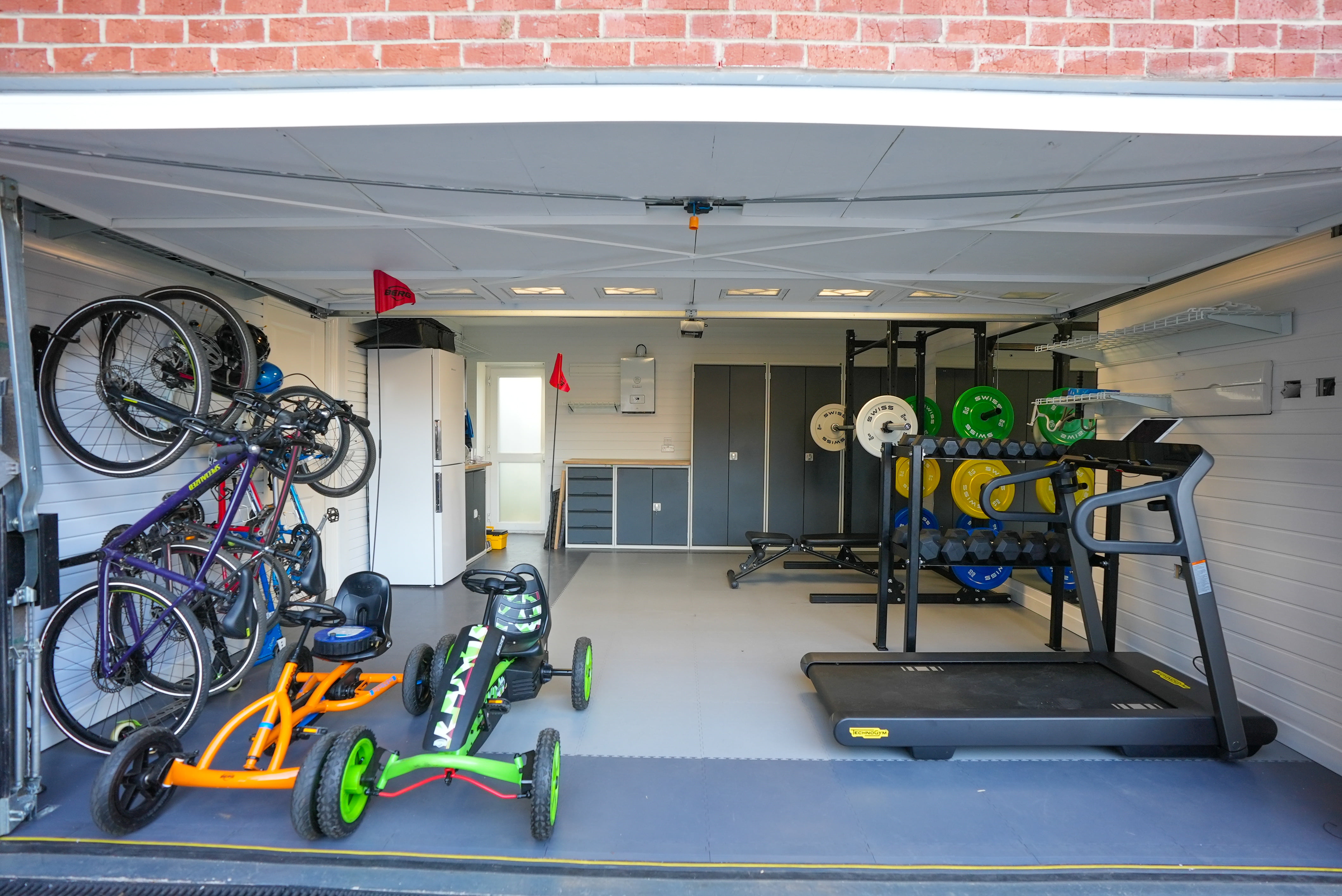 garage makeover with home gym and bike storage