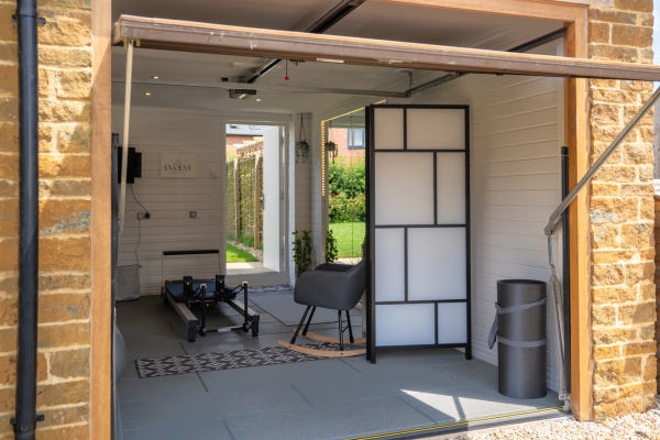 A single garage reinvented as a Professional Reformer Pilates Studio